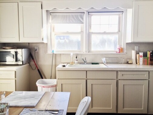Picture of a white kitchen with white cupboards