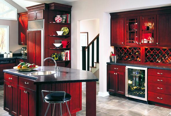 Picture of dark red cabinets in a white kitchen